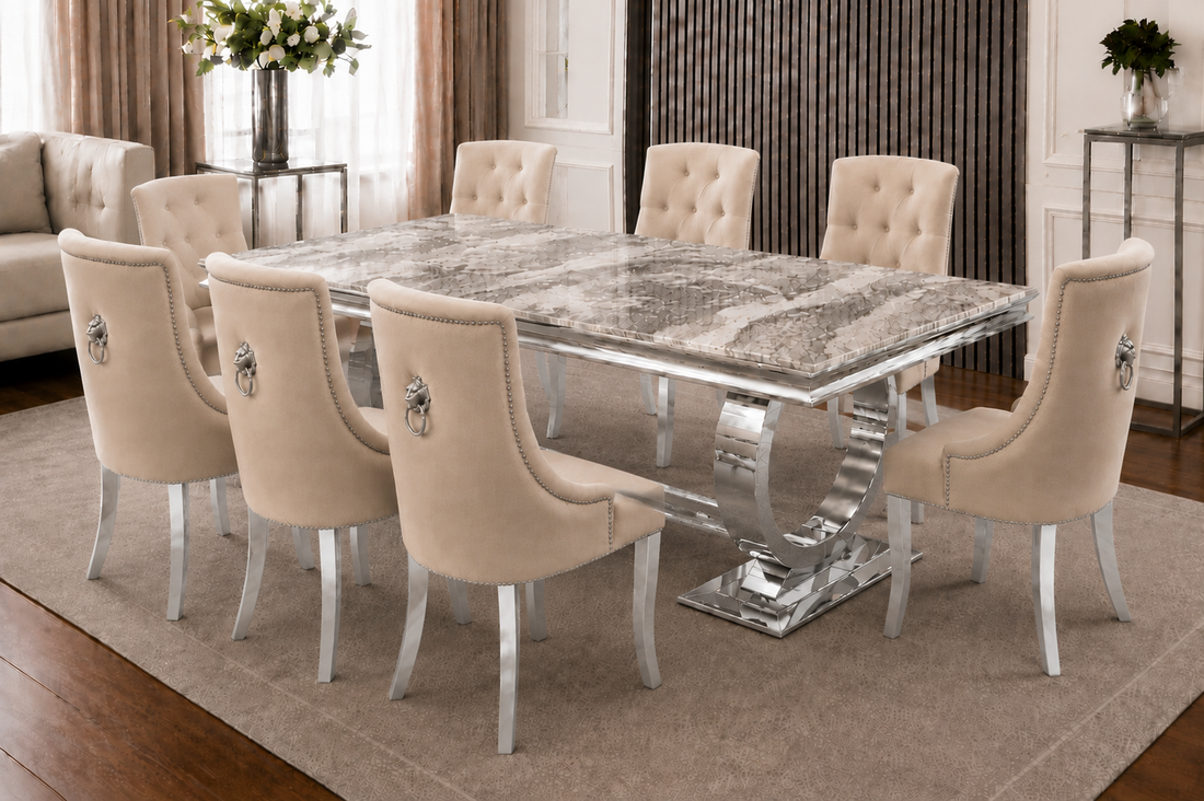 A luxury Chelsea Lewis Verona Gold Marble Dining set with four chairs.