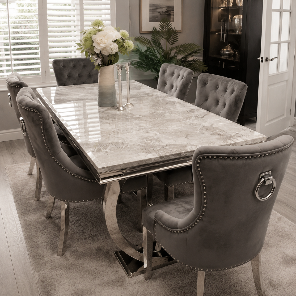 Arianna with 6 Chelsea Lion Knocker Chairs